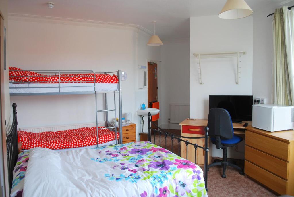 Postel nebo postele na pokoji v ubytování Clift Guest House