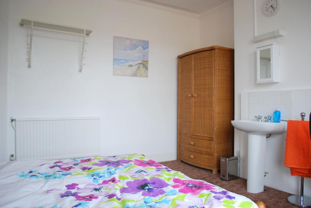 Postel nebo postele na pokoji v ubytování Clift Guest House