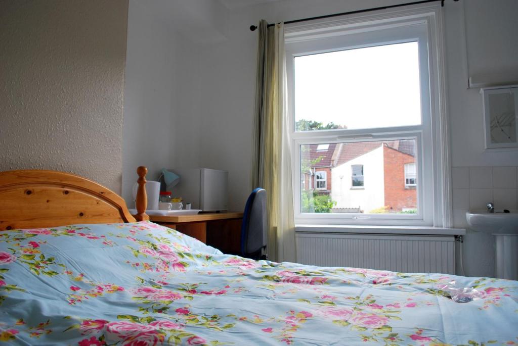 Postel nebo postele na pokoji v ubytování Clift Guest House