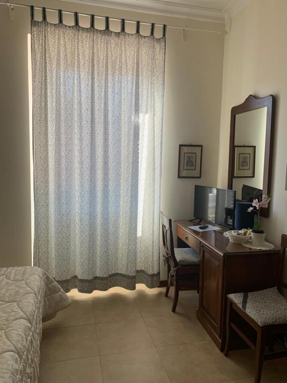 Postel nebo postele na pokoji v ubytování Villa Orsini