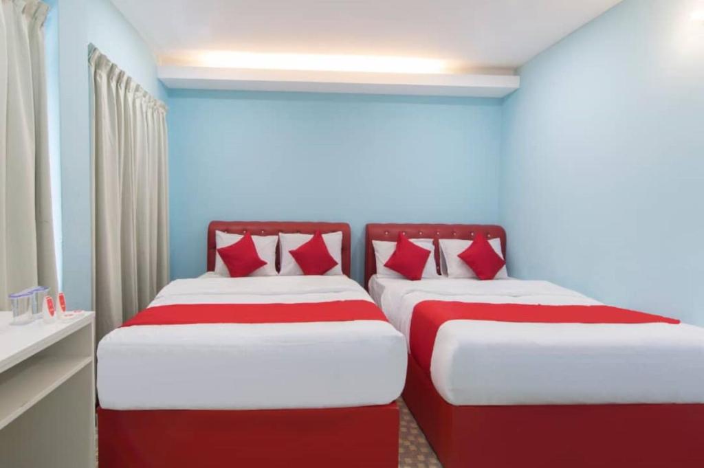 Postel nebo postele na pokoji v ubytování Star Hotel