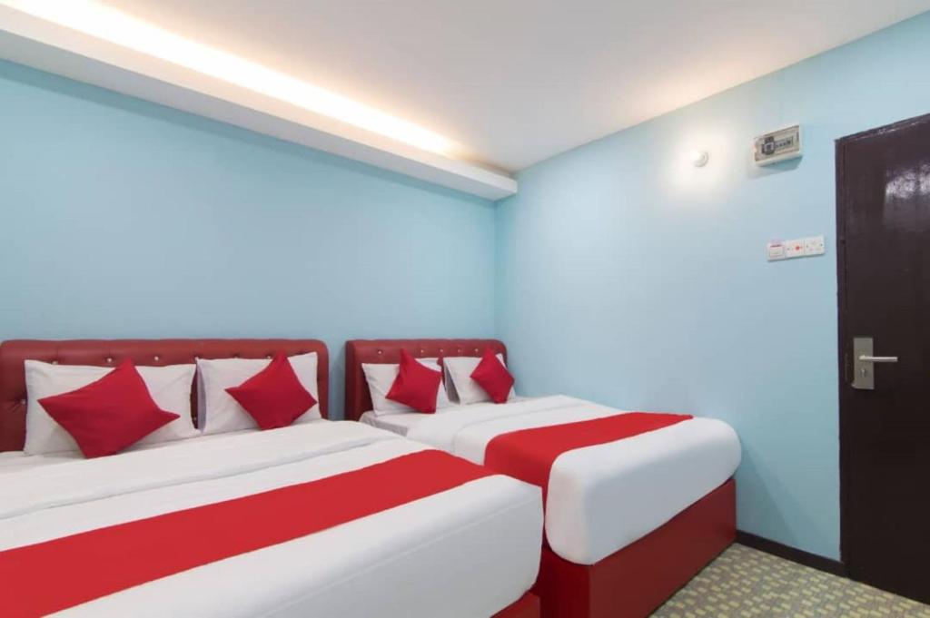 Postel nebo postele na pokoji v ubytování Star Hotel