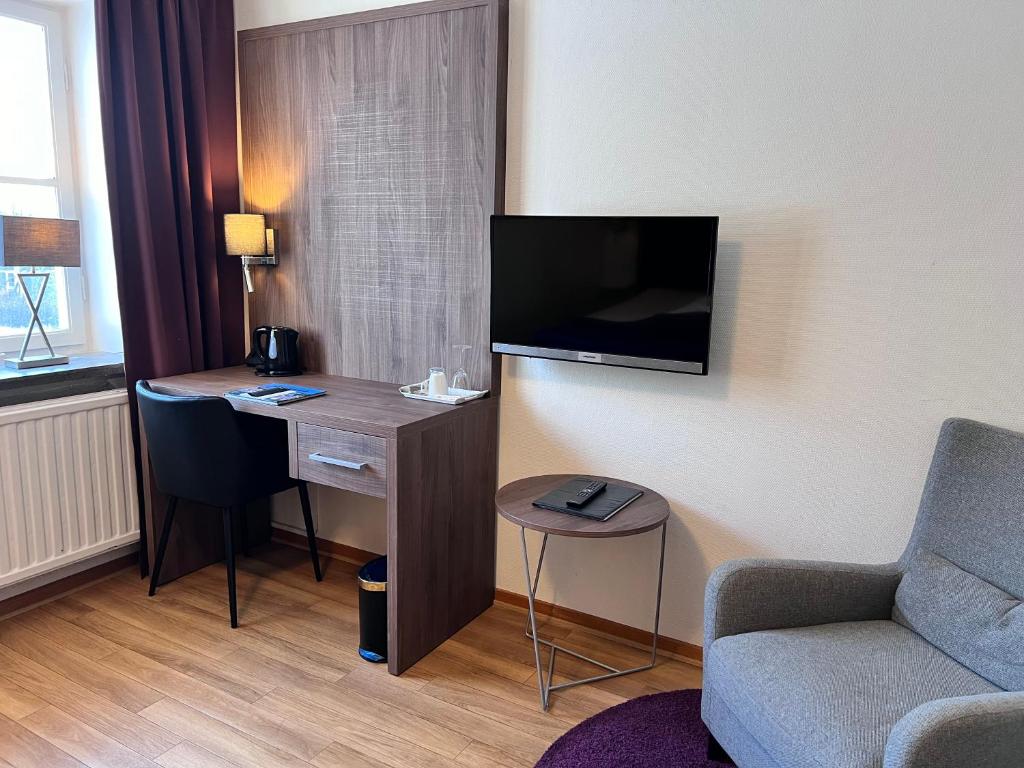 TV a/nebo společenská místnost v ubytování Hotel Wictoria