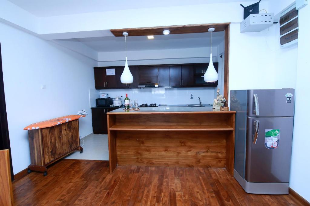 Kuchyň nebo kuchyňský kout v ubytování Nelma's Cosy