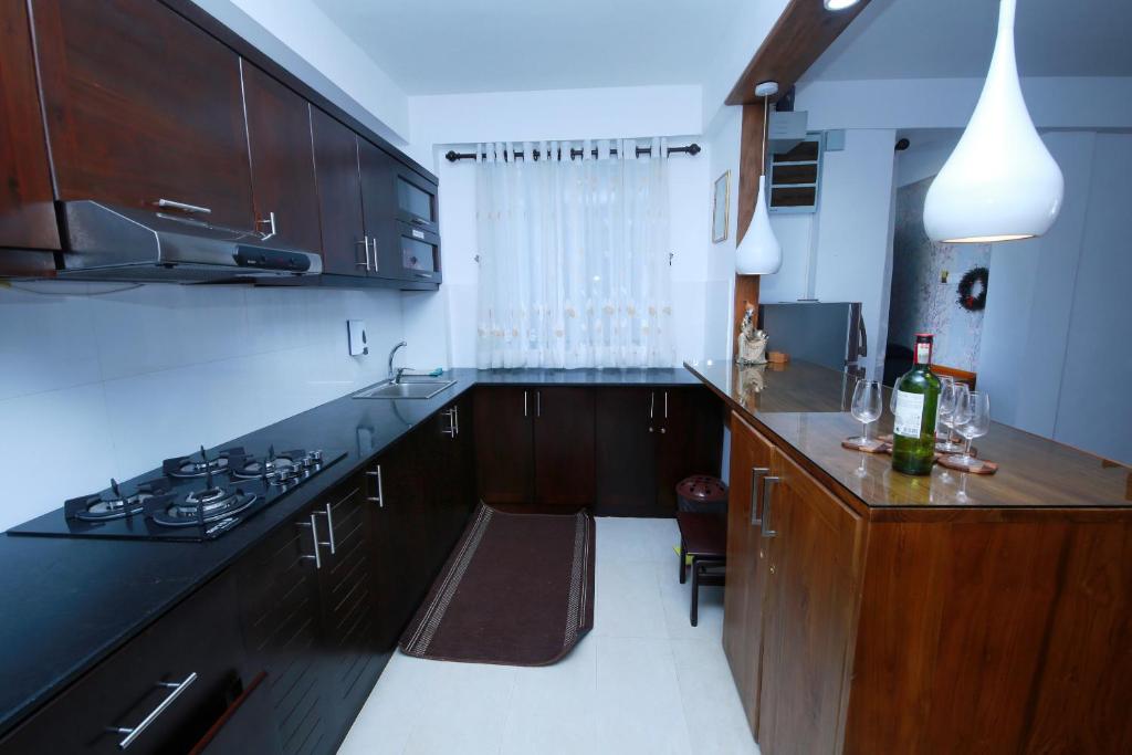 Kuchyň nebo kuchyňský kout v ubytování Nelma's Cosy