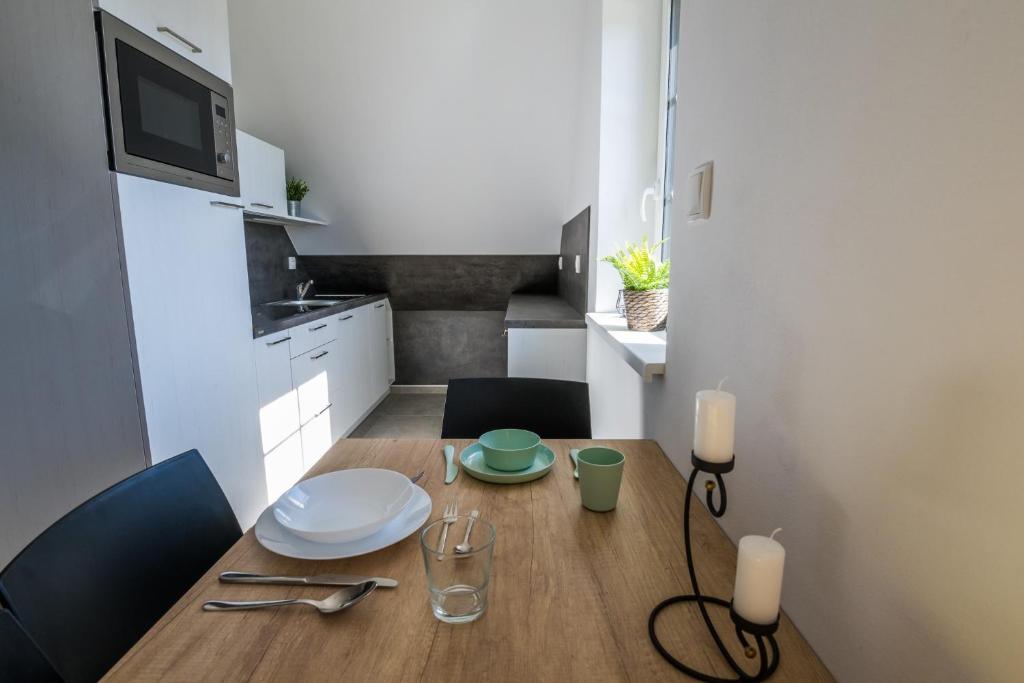 Kuchyň nebo kuchyňský kout v ubytování APARTMÁNY ATHEL KVILDA