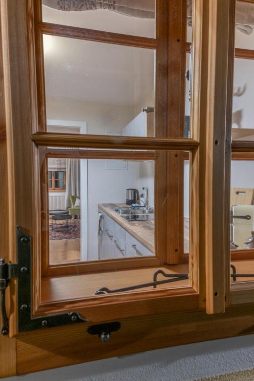Kuchyň nebo kuchyňský kout v ubytování Modernes Apartment in altem Bauernhaus