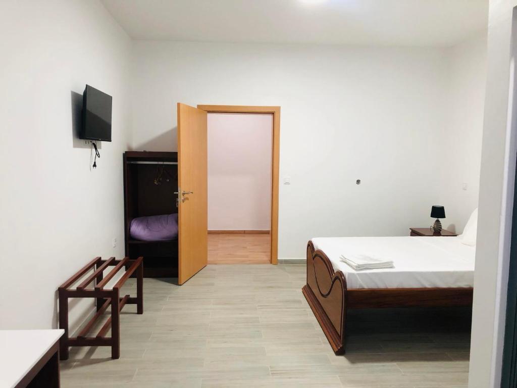 TV a/nebo společenská místnost v ubytování Edificio Cosec Hotel