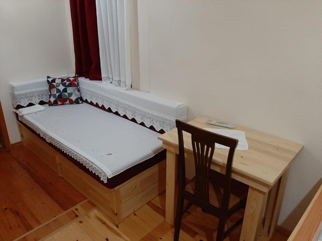 Una cama o camas en una habitación de Hotel Brahimi