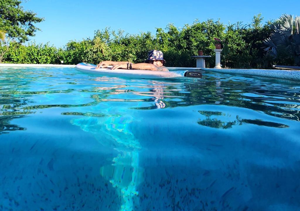 a person in a kayak in a swimming pool at LiberaLiCostaRica in Marbella