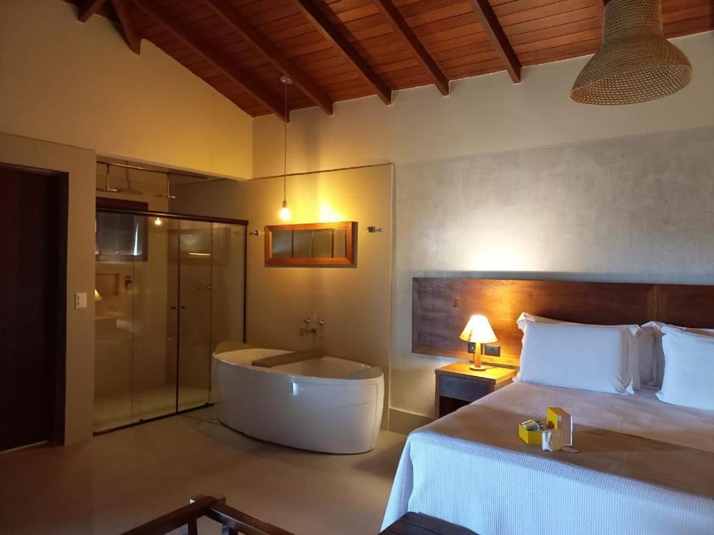 Cama ou camas em um quarto em Hiu Hotel