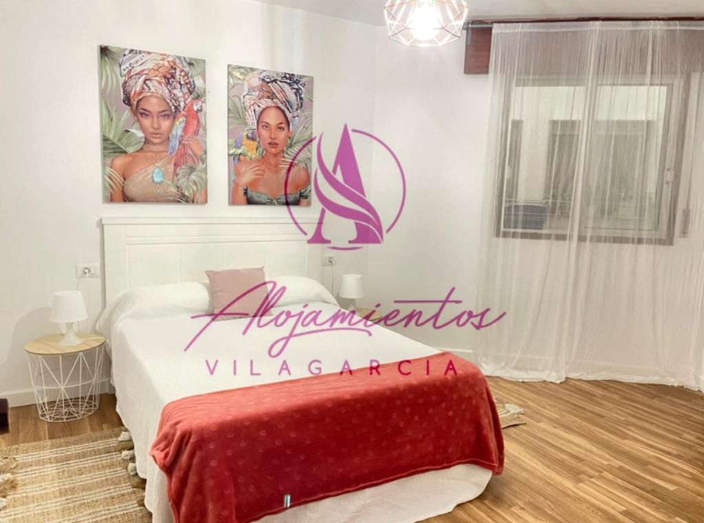 A bed or beds in a room at Alojamiento Juan Carlos I