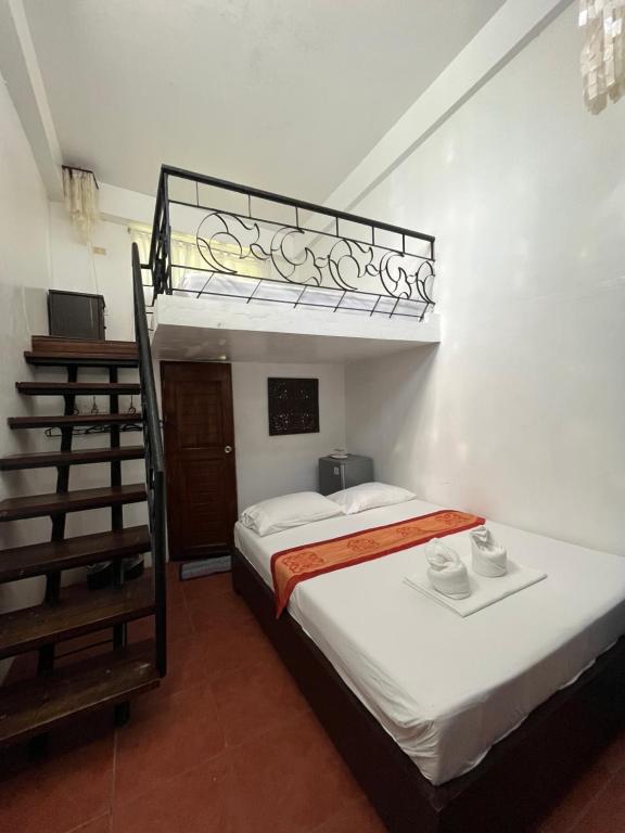 Postel nebo postele na pokoji v ubytování Boracay Ocean Bay Hotel