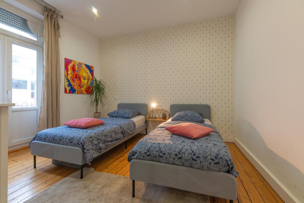 Plumeria - Grand Appartement 75m2 - Au calme - Proche Gare, Nouvelle Ville - Parking Public Gratuit - 2 Chambres - 4 Lits séparés - Apartamento De Dos Dormitorios
