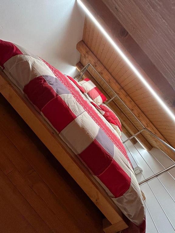 Letto o letti in una camera di BAITA GHITIN