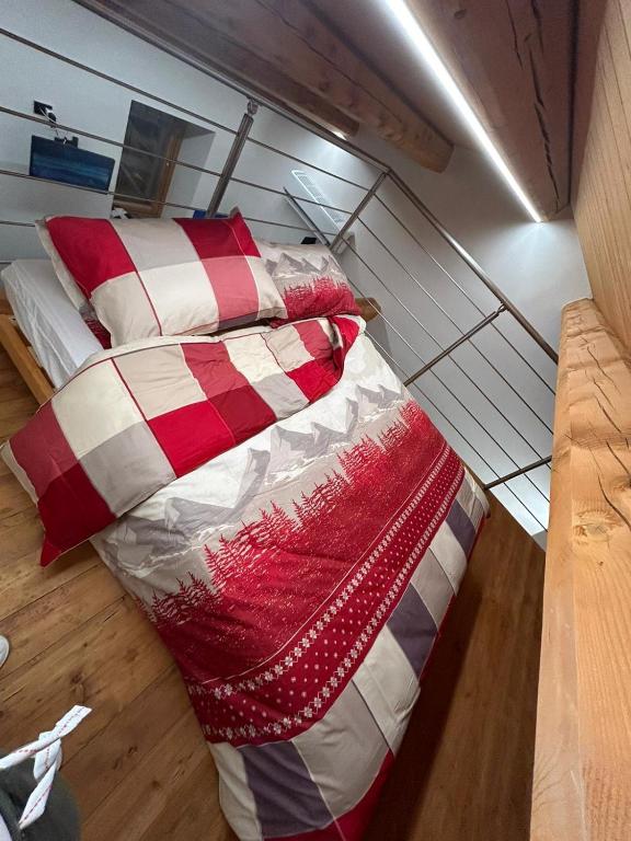 Letto o letti in una camera di BAITA GHITIN