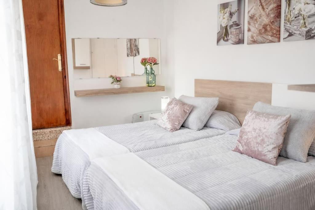 Postel nebo postele na pokoji v ubytování Casa Alfocea