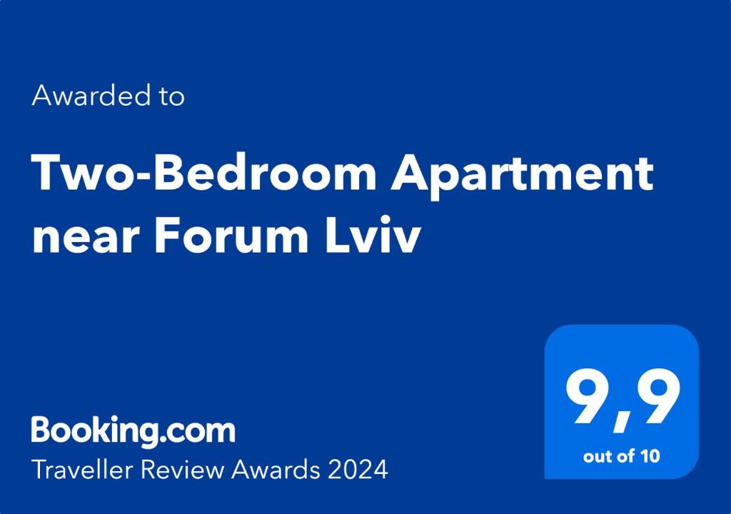 ein blaues Schild mit den Worten: Apartment mit 2 Schlafzimmern in der Nähe von Ameisenfresser in der Unterkunft Two-Bedroom Apartment near Forum Lviv in Lwiw