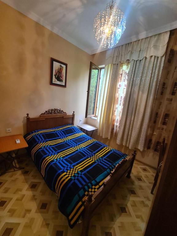 Postel nebo postele na pokoji v ubytování Camellia