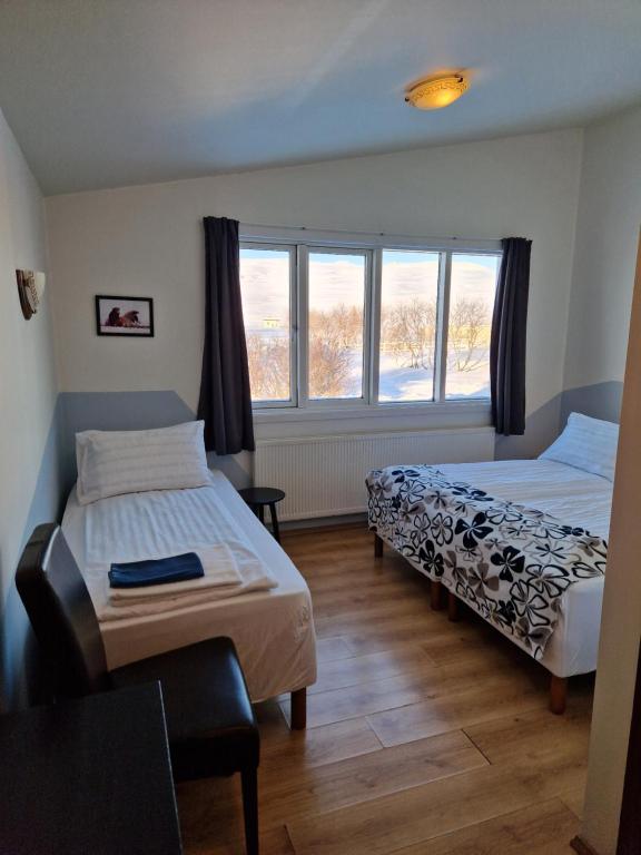 Postel nebo postele na pokoji v ubytování Gauksmýri guesthouse lodge