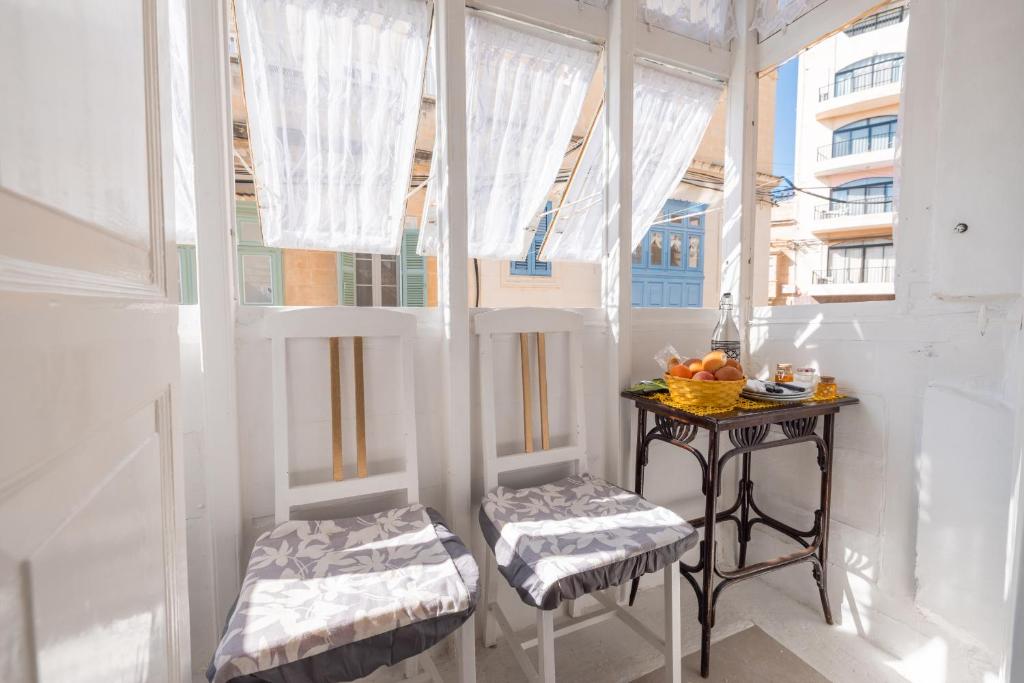 Posezení v ubytování Encanto Townhouse Sliema