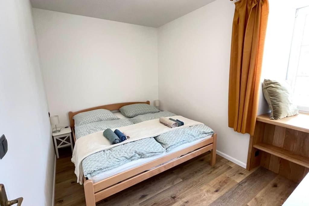 Postel nebo postele na pokoji v ubytování Apartmán na Faře