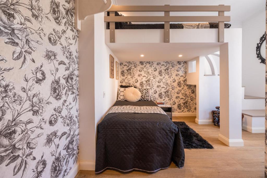 Postel nebo postele na pokoji v ubytování Encanto Townhouse Sliema