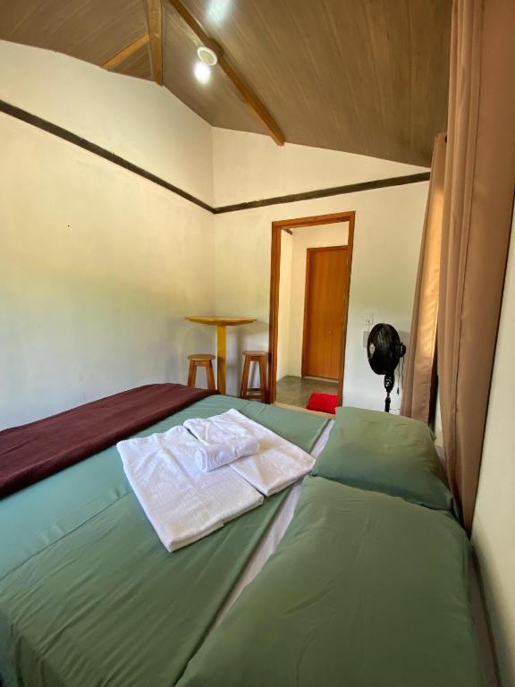 Postel nebo postele na pokoji v ubytování Hospedagem Vilella Da Serra
