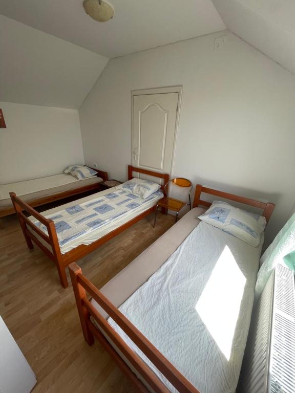 Postel nebo postele na pokoji v ubytování Mimoza JD