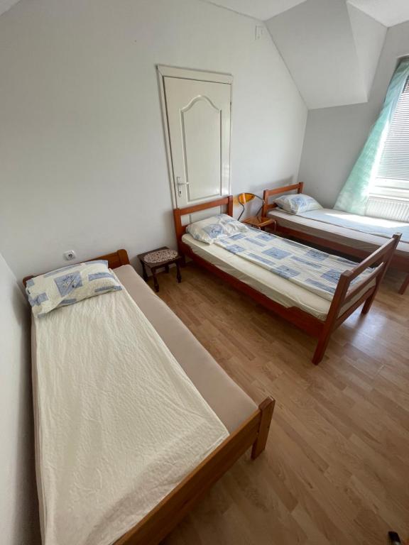 Postel nebo postele na pokoji v ubytování Mimoza JD