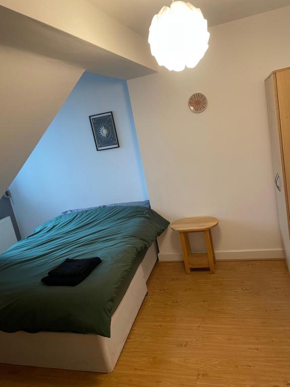 Ένα ή περισσότερα κρεβάτια σε δωμάτιο στο Westend Villas