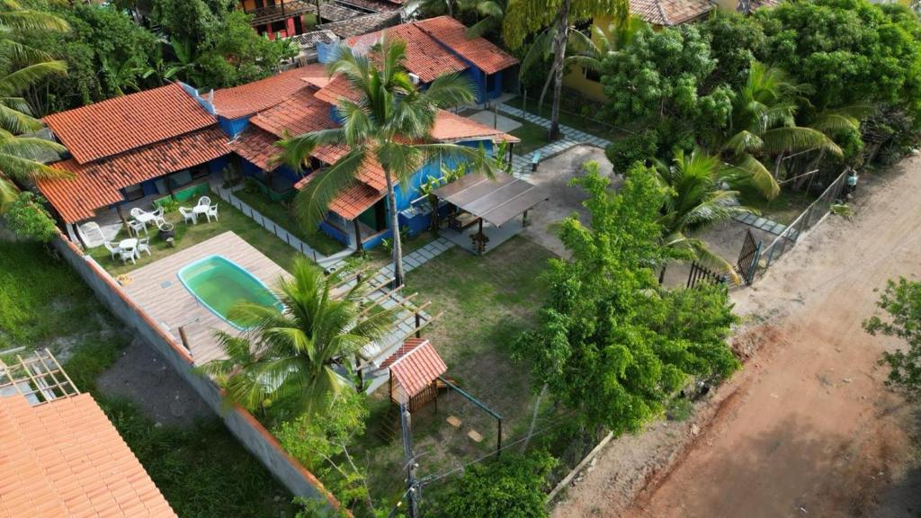 an overhead view of a house with a swimming pool at Pousada Costa Azul in Barra Grande