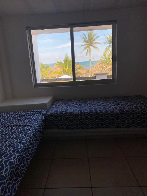 Postel nebo postele na pokoji v ubytování Hotel Torre Molino