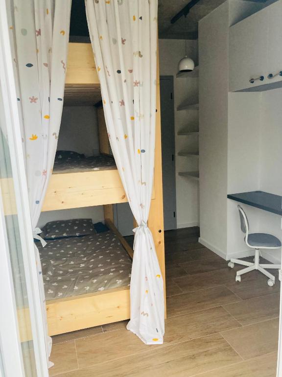Postel nebo postele na pokoji v ubytování Soví Hnízdo Apartment De Luxe