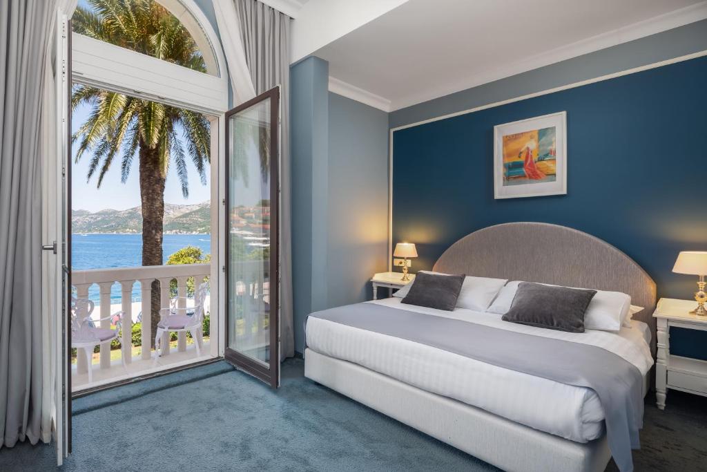 Кровать или кровати в номере Aminess Younique Korcula Heritage Hotel