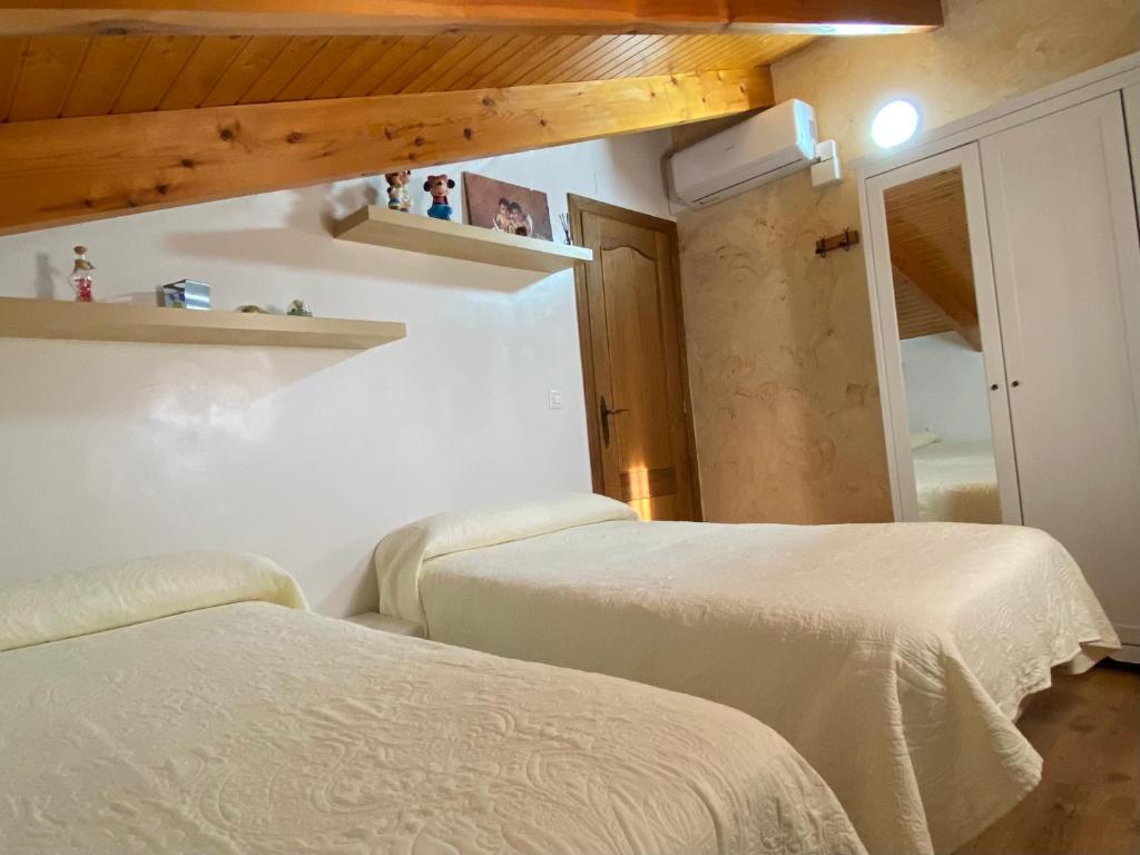 Postel nebo postele na pokoji v ubytování Chalet en Librilla