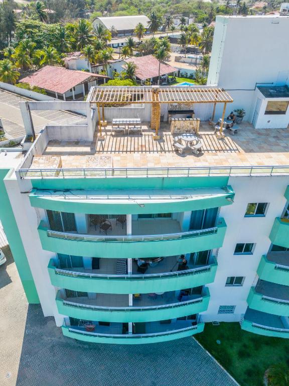 an aerial view of a building at Aloha Vibes Ap Cumbuco - Green Club in Cumbuco