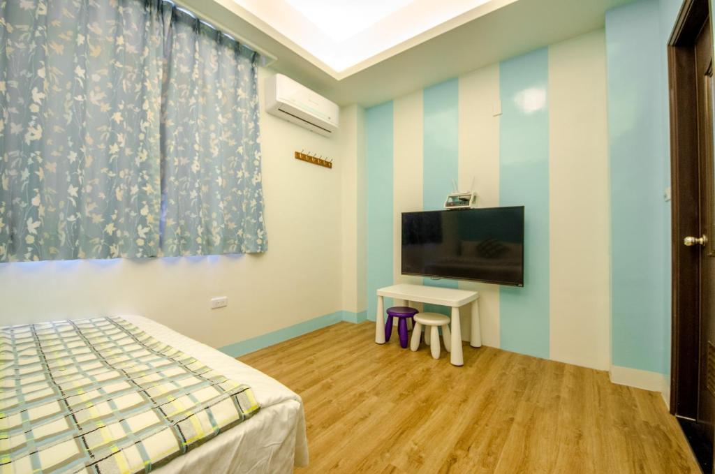 TV a/nebo společenská místnost v ubytování Dan Dan Bed and breakfast