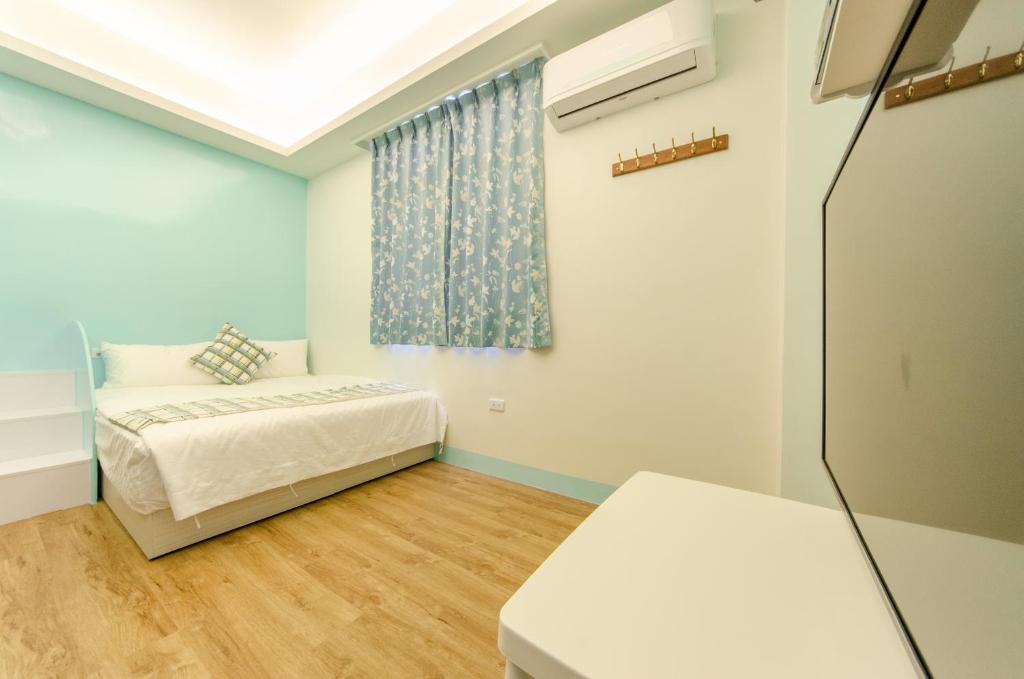 Postel nebo postele na pokoji v ubytování Dan Dan Bed and breakfast