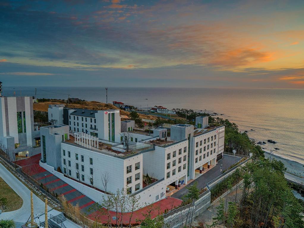 an aerial view of a building near the ocean at Best Western Plus GyeongJu in Gyeongju