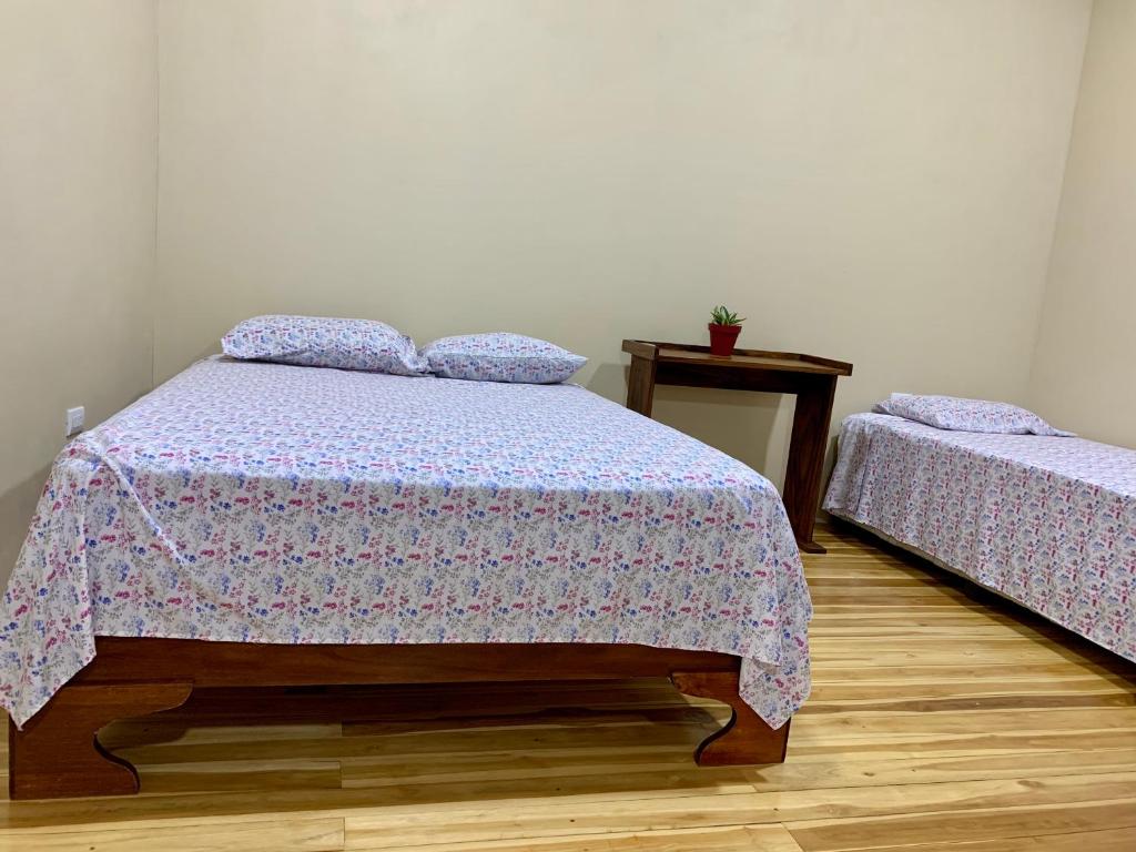 Кровать или кровати в номере Verde Amanecer