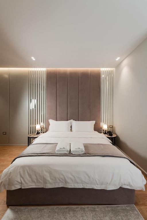 Cama o camas de una habitación en Troci Hotel