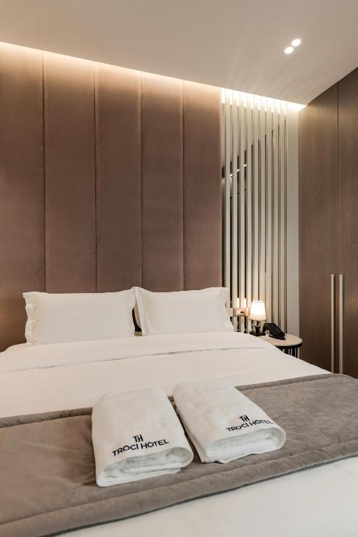 Cama o camas de una habitación en Troci Hotel