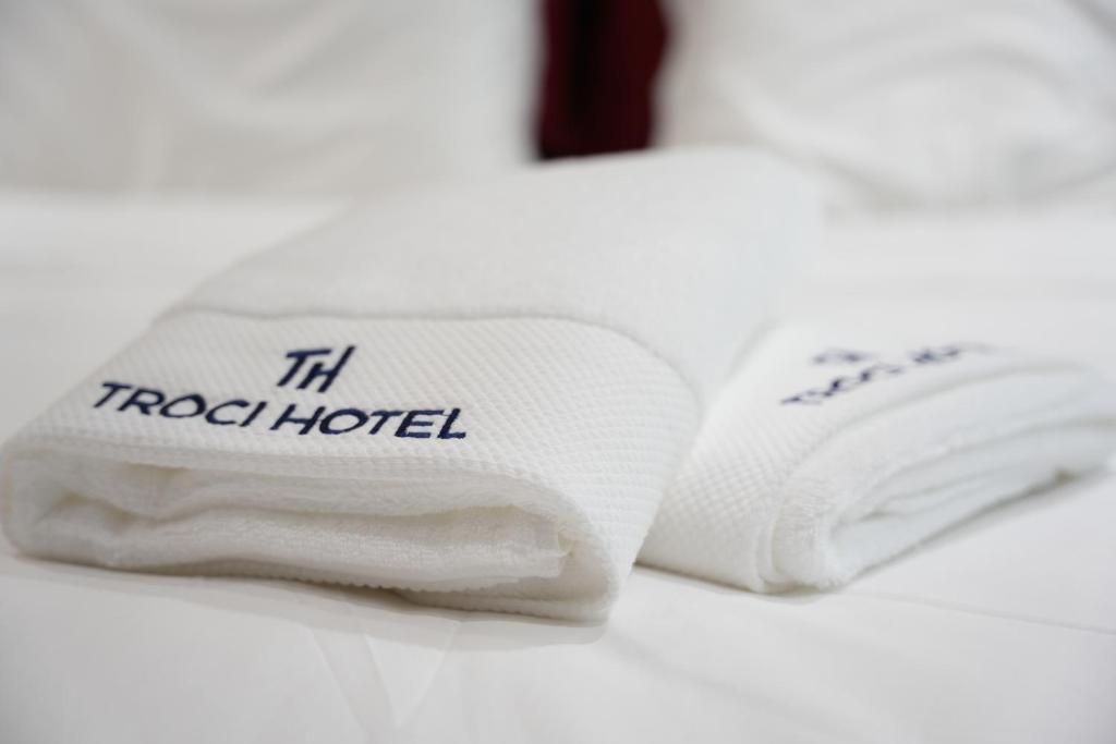 Cama o camas de una habitación en Troci Hotel