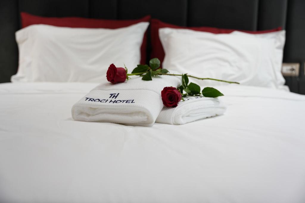 Cama o camas de una habitación en Troci Hotel