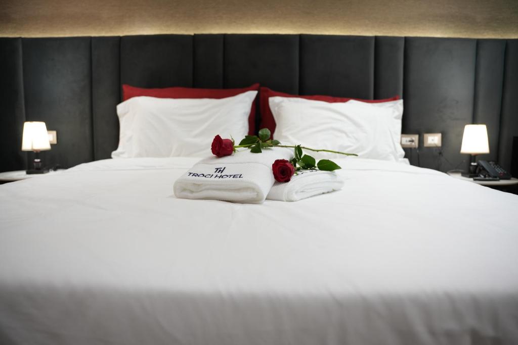 Cama o camas de una habitación en Troci Hotel