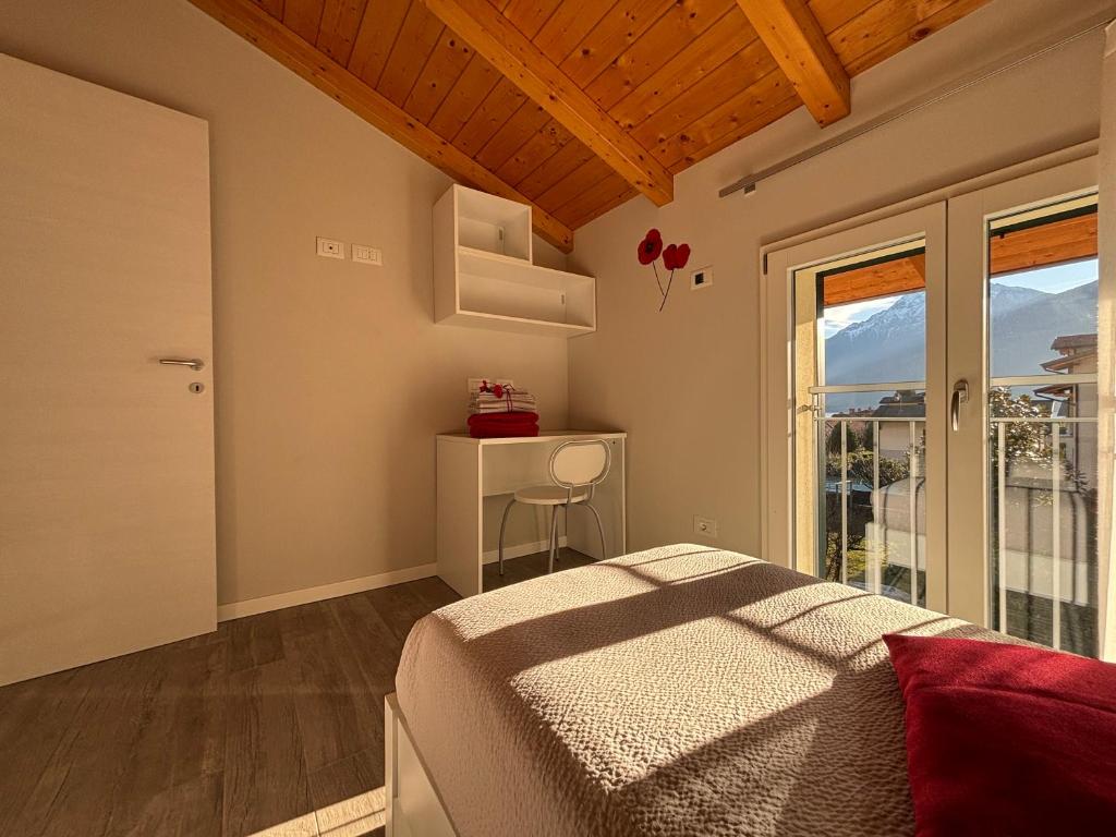 Postel nebo postele na pokoji v ubytování Ca' Ben Dongo - Larihome A53