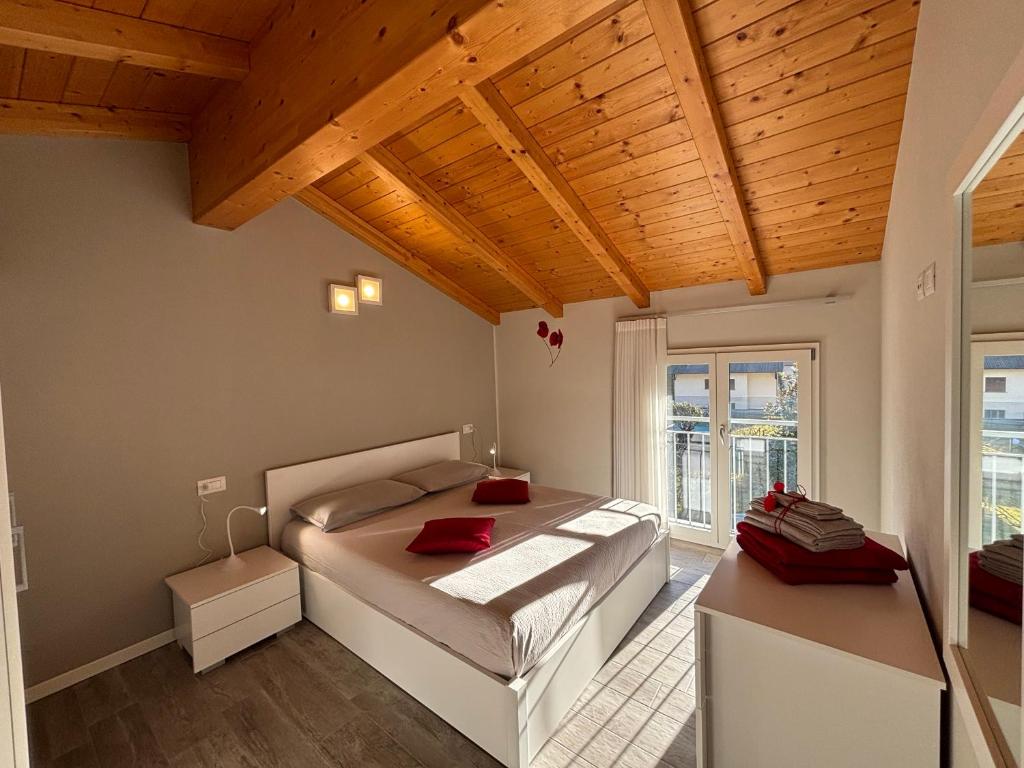Postel nebo postele na pokoji v ubytování Ca' Ben Dongo - Larihome A53