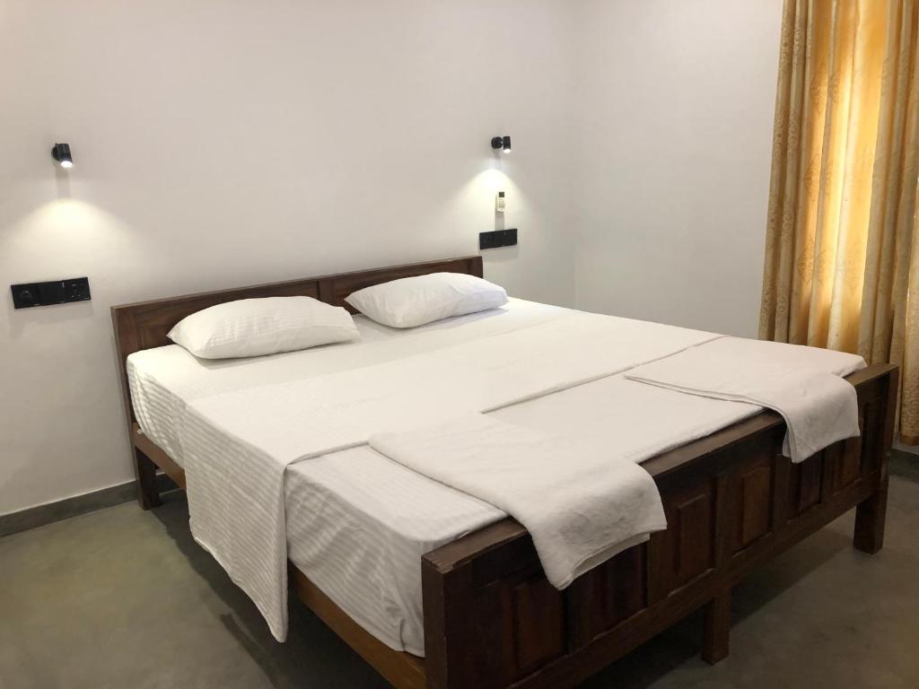 Ένα ή περισσότερα κρεβάτια σε δωμάτιο στο Villa Bilimbi