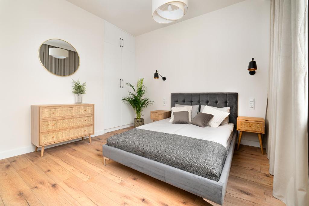Cama ou camas em um quarto em Iris Apartament